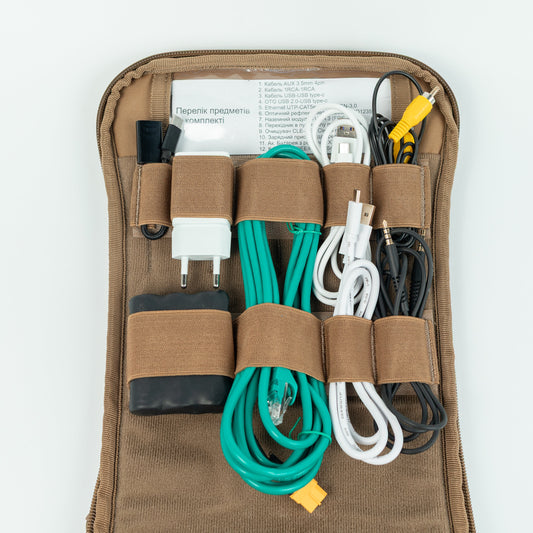Brown organizer with electronic cables and chargers on a white background