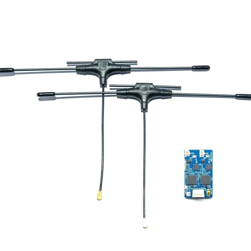 Two metal antennas with a small blue circuit board on a white background