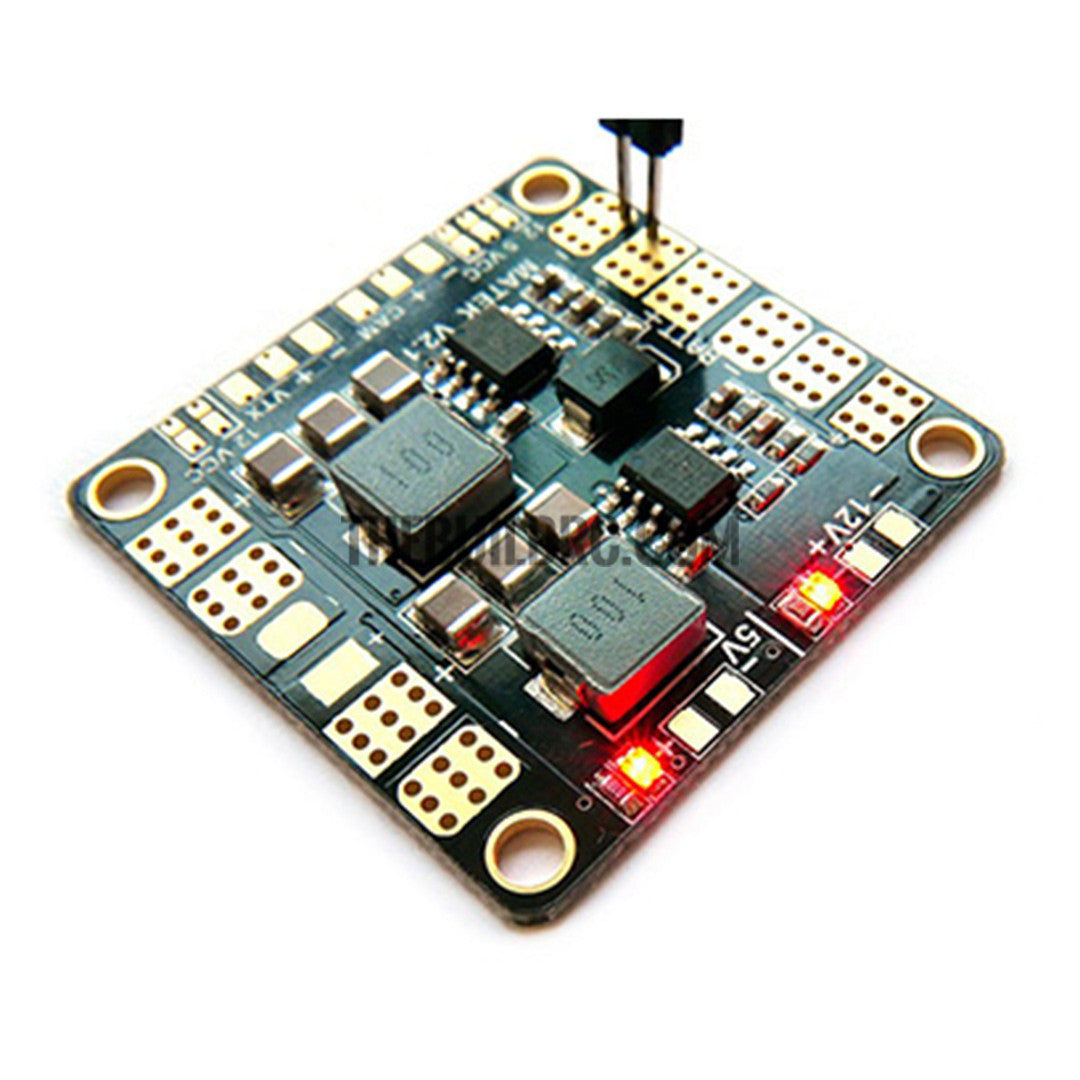 Matek Mini Power Hub V3.1 — angled close-up with LEDs on