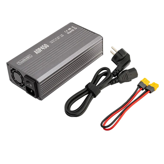A Tooshop ADA450 12V/24V power adapter with a black metal casing, shown alongside its attached black power cable and red/black battery connector leads with yellow plugs, on a white background.